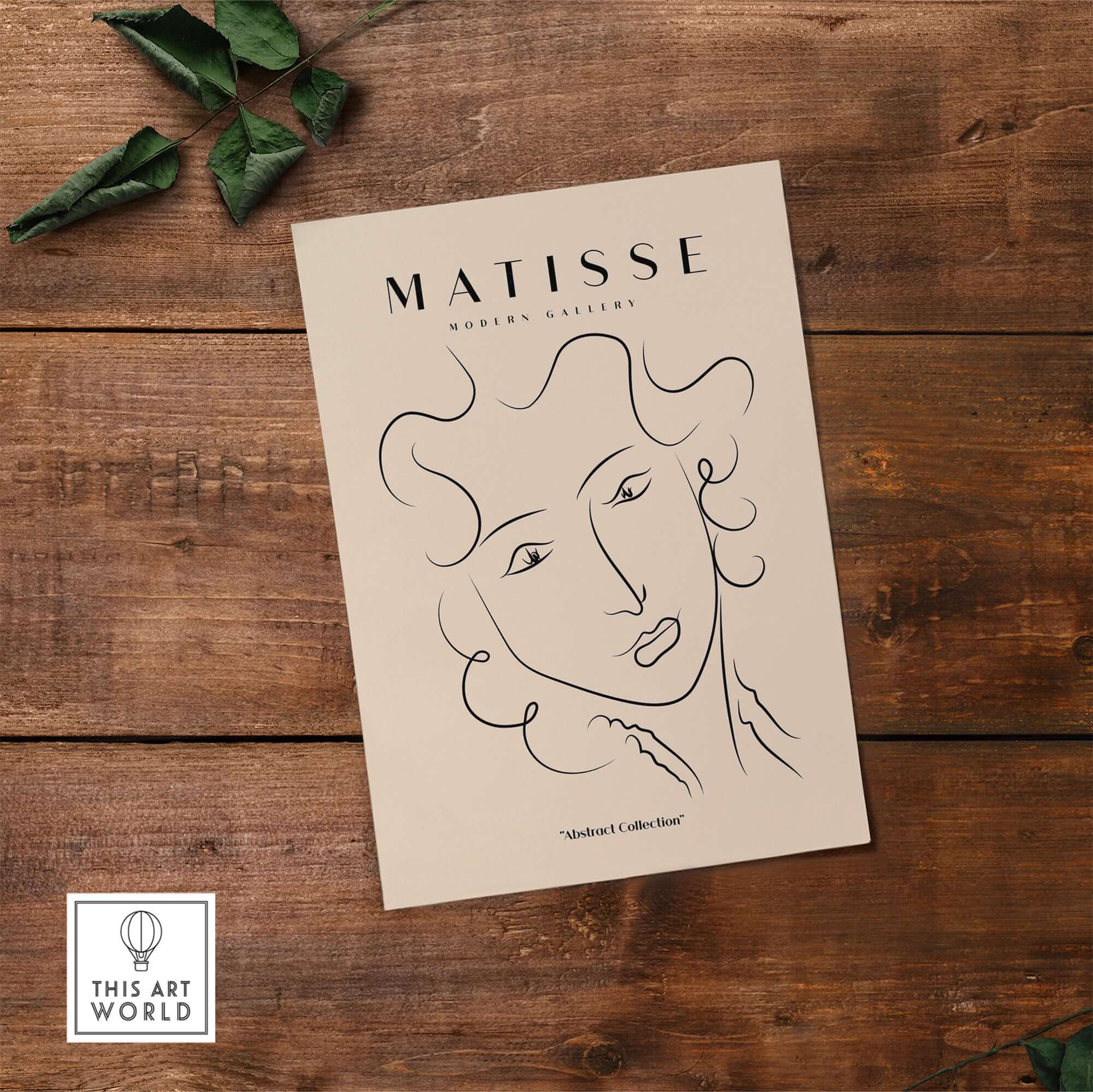 Matisse Art Prints -  Line Art Ladies Face with Wavy Hair Minimalist Poster on a wooden background with greenery.