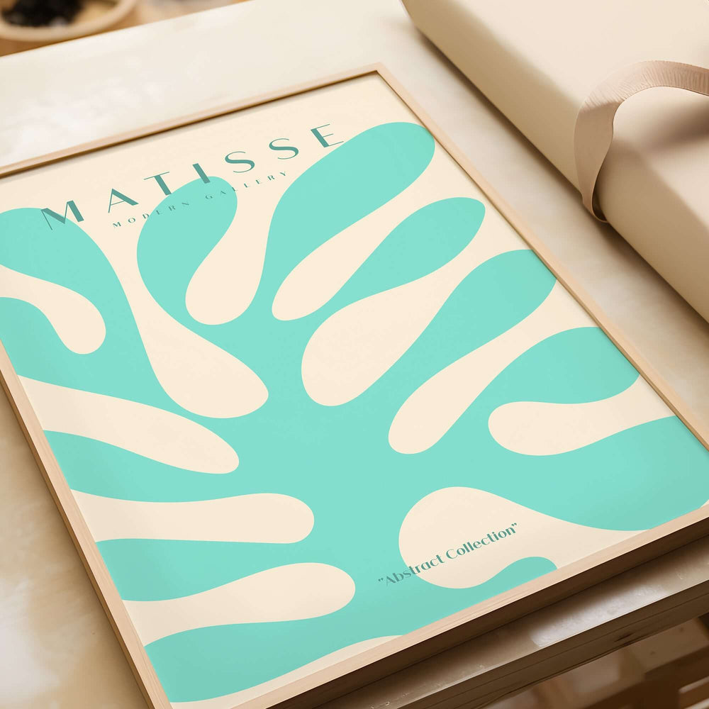 Matisse Art Prints - Mint Green Coral Abstract Seaweed Poster displayed in a frame with a soothing sea-themed design.