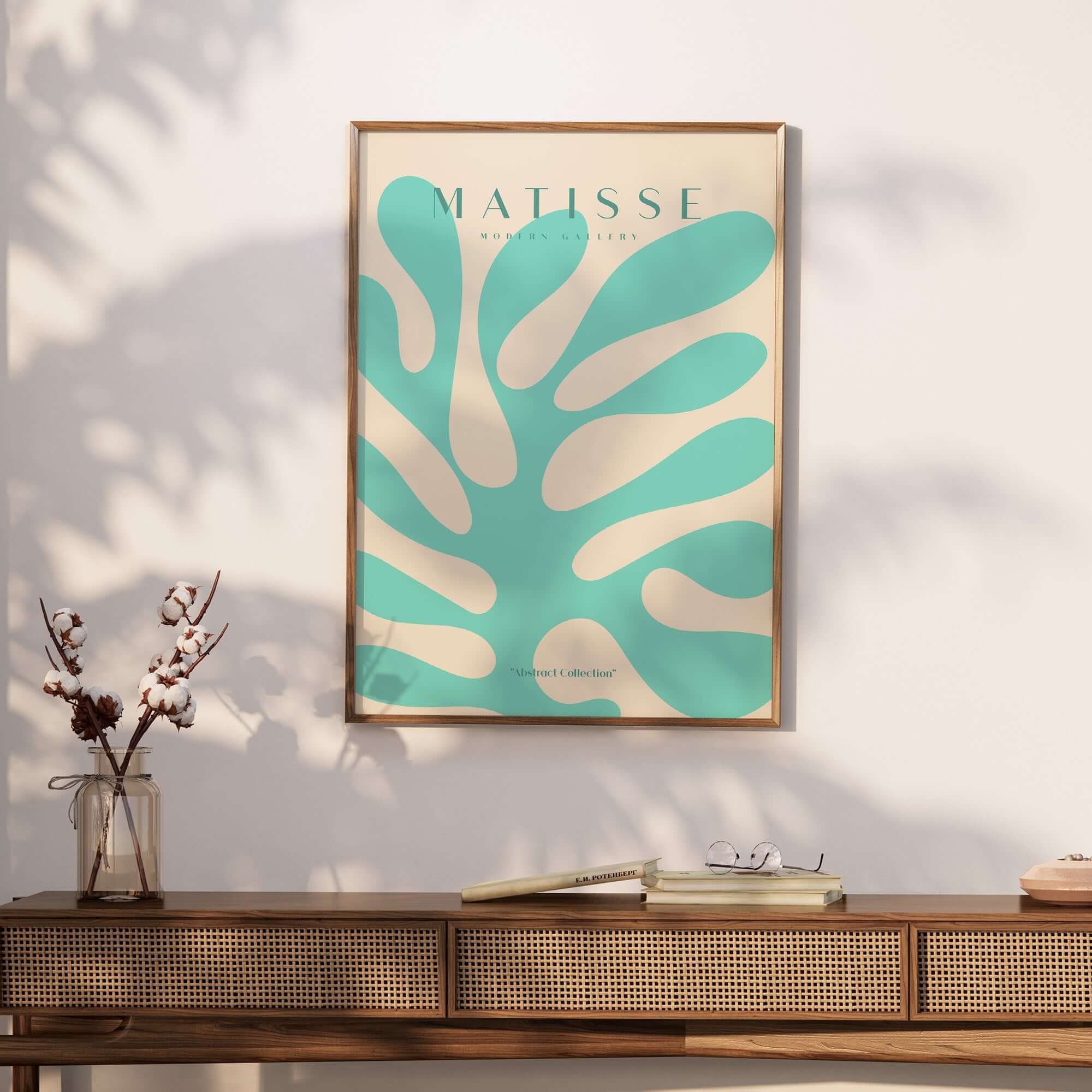 Matisse Art Prints - Mint Green Coral Abstract Seaweed Poster displayed in a modern setting with a wooden table and decor.
