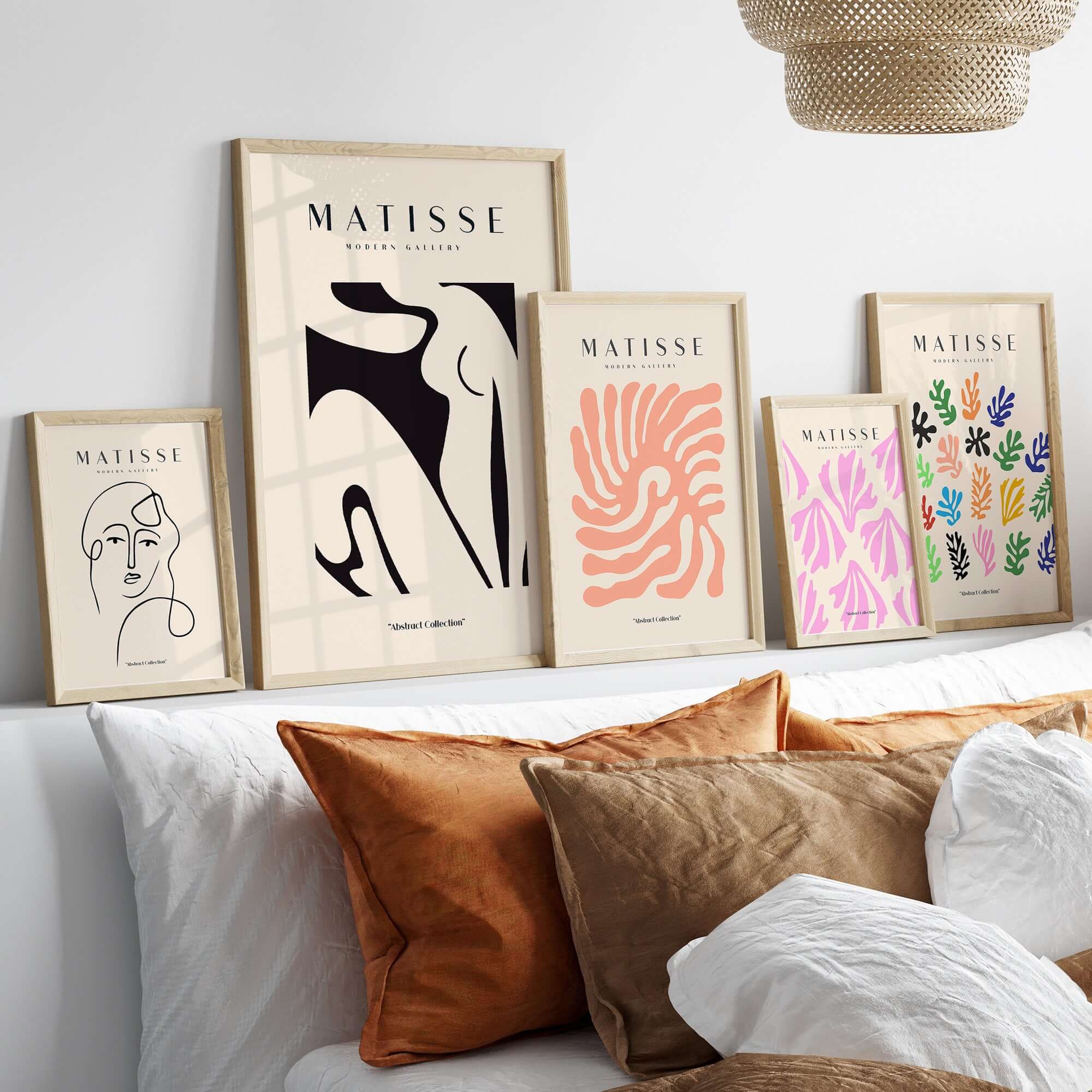 Matisse Art Prints - Black Abstract Nude Figure Poster showcased with other abstract art prints on a stylish wall decor.