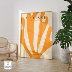 Matisse Art Prints -  Orange Fan Coral Abstract Shape Poster displayed in a stylish interior with natural elements.