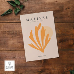 Matisse Art Prints - Orange Seaweed Abstract Art Print featuring vibrant orange form on beige background.