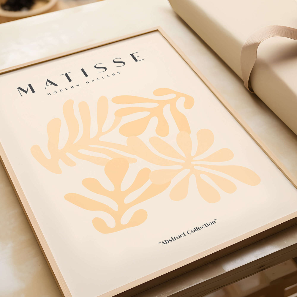 Matisse Art Prints - Pale Peach Abstract Shapes Wall Art displayed in a modern frame with floral shapes.