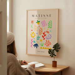 Matisse Art Prints - Playful Abstract Shapes Mix Wall Art featuring colorful shapes and designs in a cozy setting.