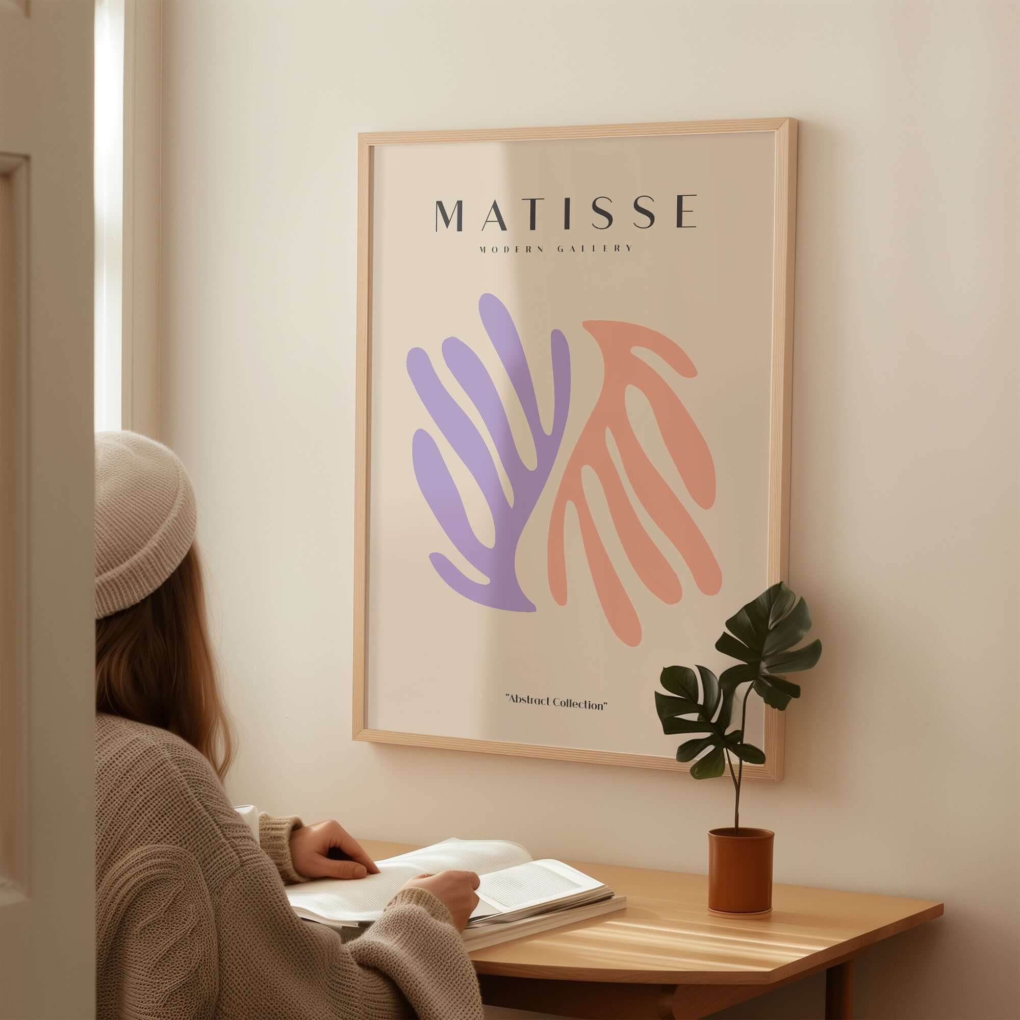 Matisse Art Prints - Purple Peach Abstract Leaves Poster displayed in a cozy interior setting with warm tones.