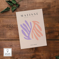 Matisse Art Prints - Purple Peach Abstract Leaves Poster featured on wooden surface with green leaves.