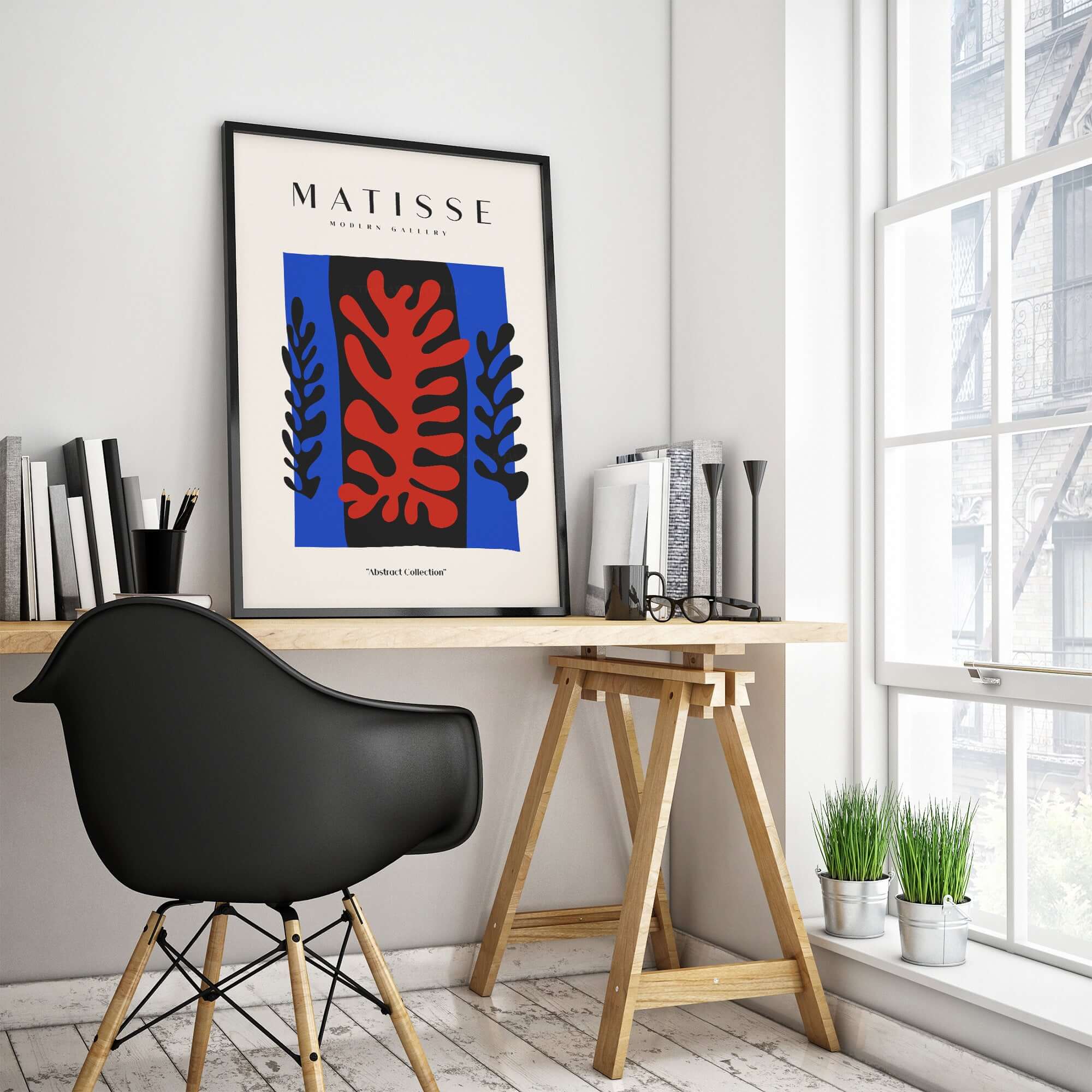 Matisse Art Prints -  Red Coral Black Leaves Blue Frame Poster displayed in a modern workspace with natural light.