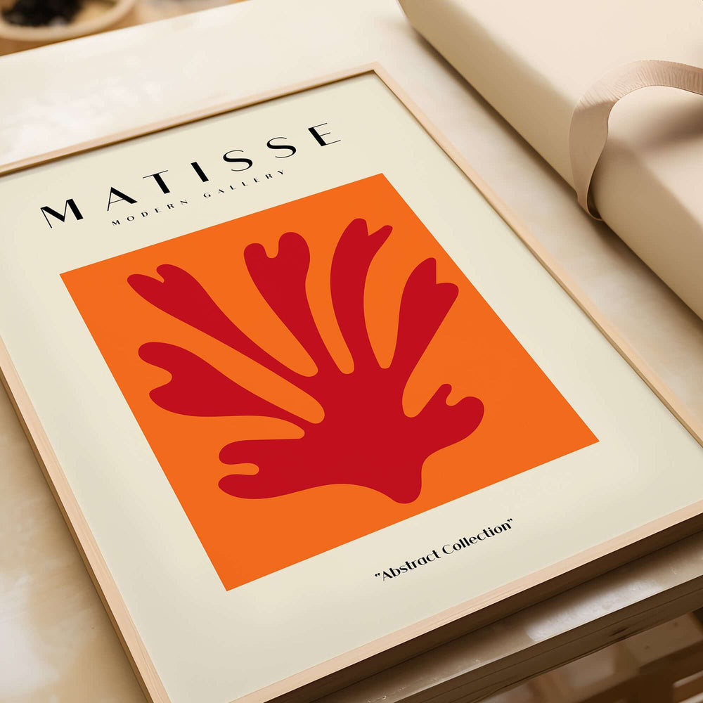 Matisse Art Prints - Red Leaf Abstract Orange Square Poster displayed in a modern gallery setting with a beige background.