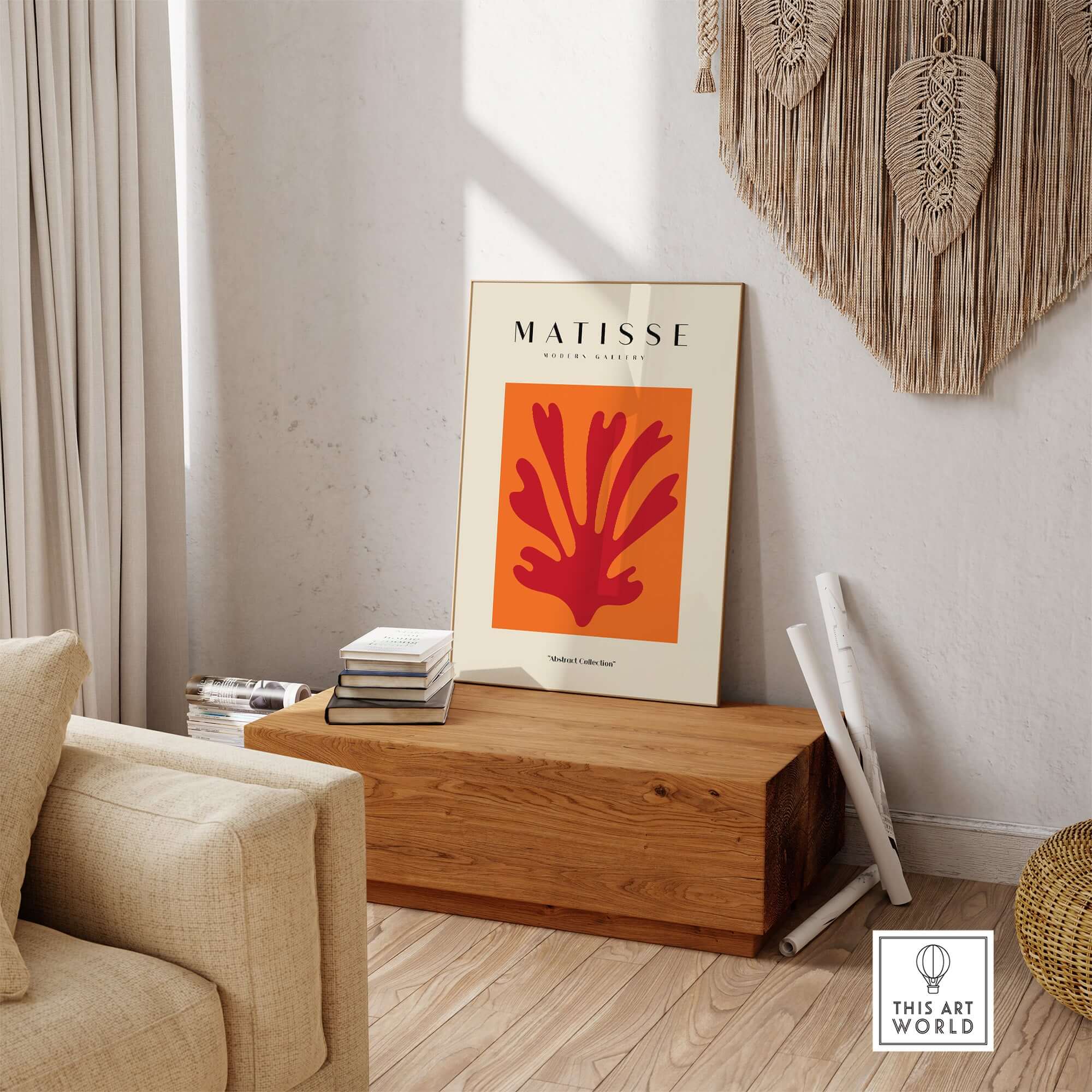 Matisse Art Prints - Red Leaf Abstract Orange Square Poster displayed on a wooden table in a cozy setting.