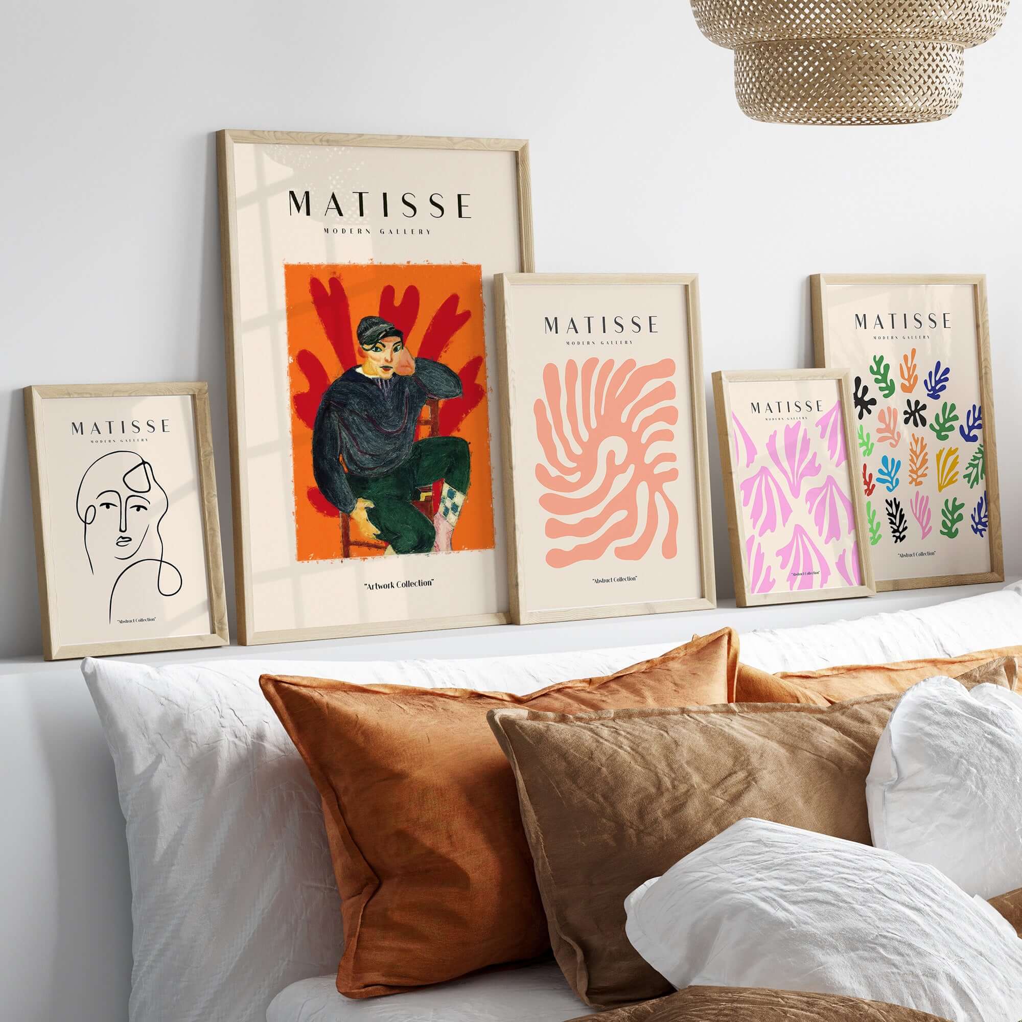 Matisse Art Prints - Seated Figure in Cap Poster and other Matisse prints displayed on a modern shelf.