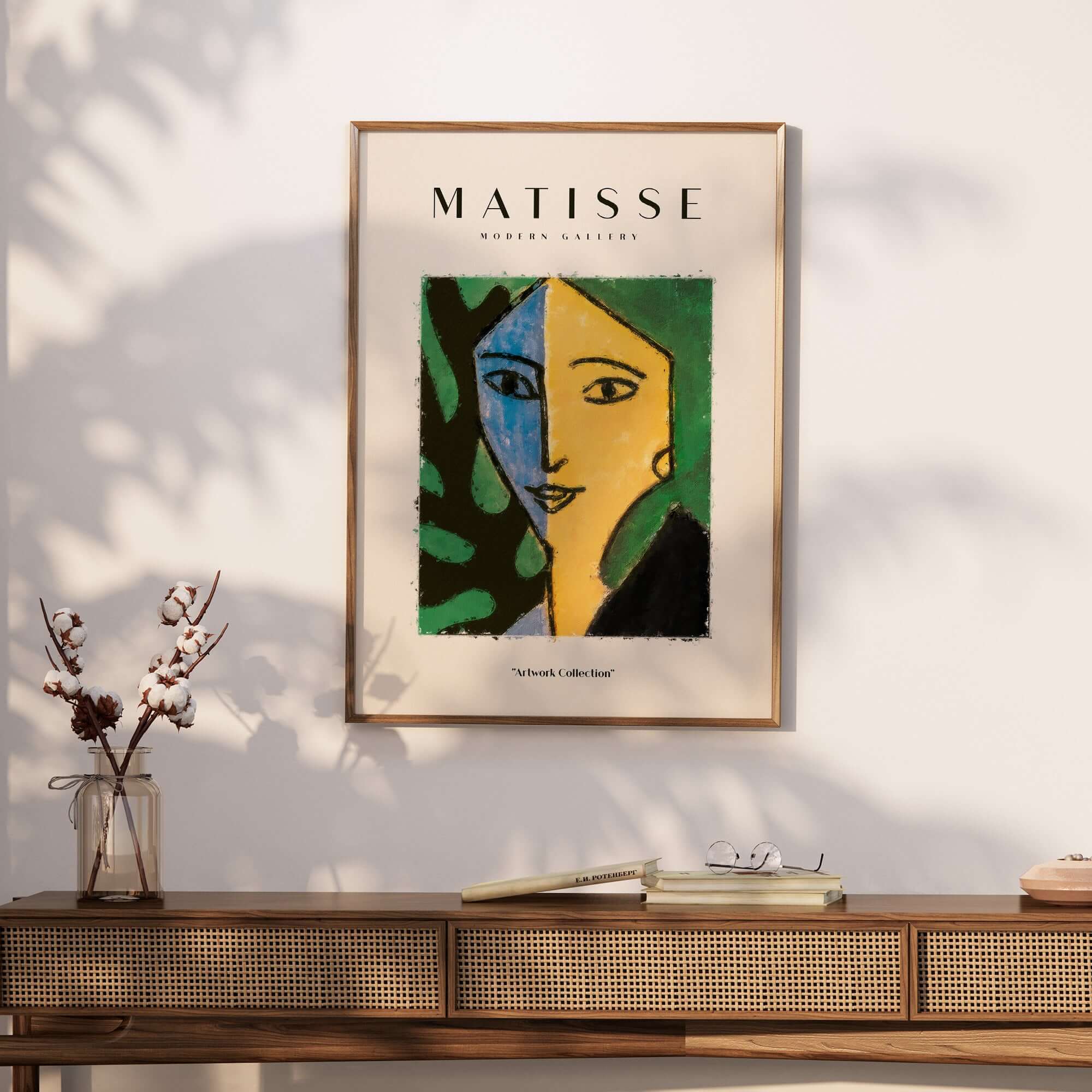 Matisse Art Prints - Split Face Blue Yellow Portrait Poster displayed on a wooden table, showcasing vibrant colors and abstract design.