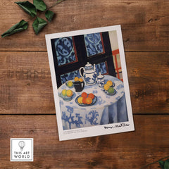 Matisse Art Prints - Still Life Blue Tablecloth Poster featuring a teapot and vibrant citrus fruits on a blue tablecloth.