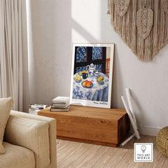 Matisse Art Prints - Still Life Blue Tablecloth Poster displayed in a cozy living room setting.