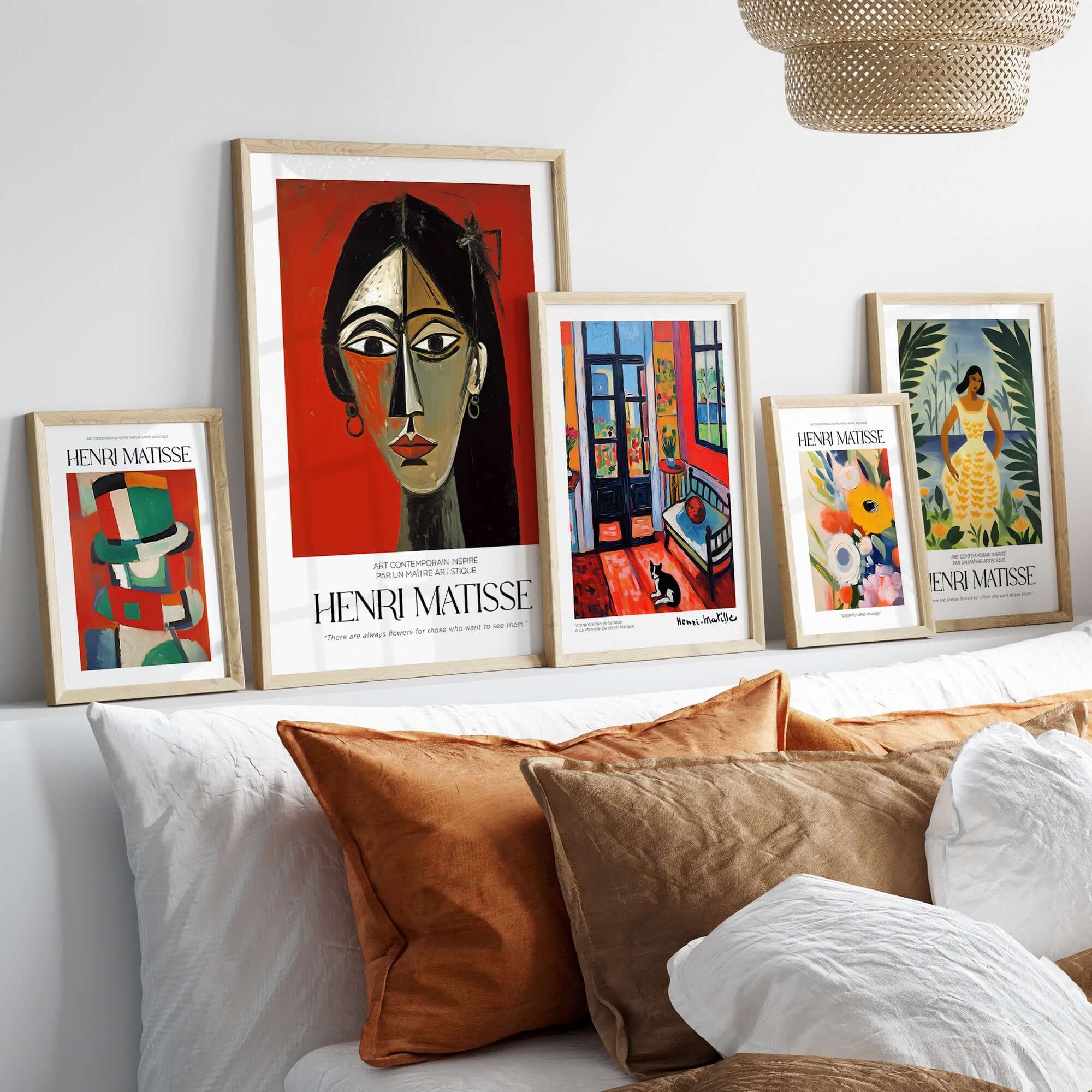 Matisse Art Prints - Stylized Woman Portrait Red Wall Art displayed in a stylish living room setting with other artworks.