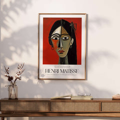 Matisse Art Prints - Stylized Woman Portrait Red Wall Art, bold modern art portrait framed on a wall.
