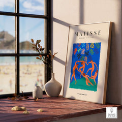 Matisse Art Prints - The Dance Figures Abstract Sky Poster displayed in a sunlit room with beach view.