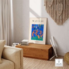 Matisse Art Prints - The Dance Figures Abstract Sky Poster displayed in a cozy room with natural decor.