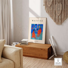 Matisse Art Prints - Two Figures Flute Poster displayed in a cozy interior with warm tones and natural decor.