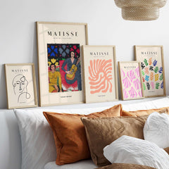 Matisse Art Prints - Two Women Guitar Interior Scene Poster displayed in elegant frames on a stylish wall.