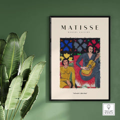 Matisse Art Prints - Two Women Guitar Interior Scene Poster displayed in modern gallery setting with greenery.