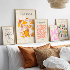 Matisse Art Prints - Warm Tone Geometric Triangles Poster displayed on a stylish wall with modern decor and colorful designs.