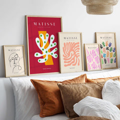 Matisse Art Prints - White Coral Abstract Green Diamonds Print displayed on a wall with decorative cushions.