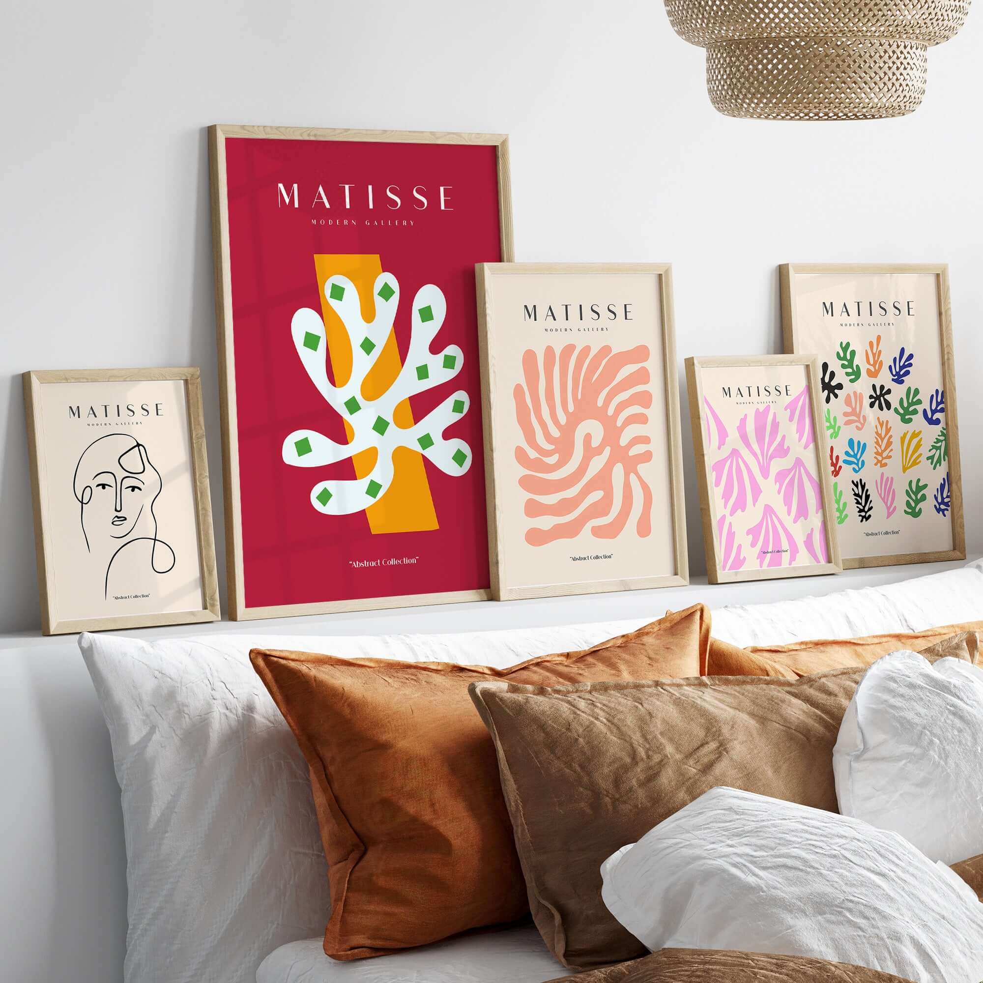Matisse Art Prints - White Coral Abstract Green Diamonds Print displayed on a wall with decorative cushions.