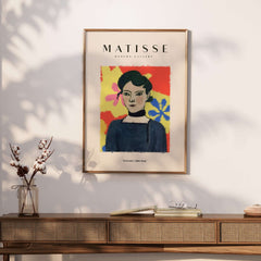 Matisse Art Prints - Woman Portrait Abstract Floral Poster featuring a woman with dark hair in a blue top against vibrant floral art.