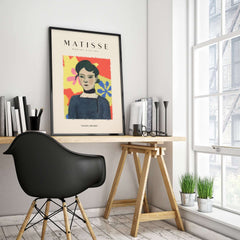 Matisse Art Prints - Woman Portrait Abstract Floral Poster displayed in a stylish workspace with modern decor.