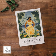 Matisse Art Prints - Woman Tropical Leaves Art Print displayed on wooden surface with greenery accents.