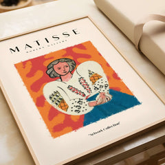 Matisse Art Prints - Woman White Blouse Blue Skirt Portrait Poster showcased in a modern frame with vibrant background.