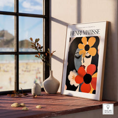 Matisse Art Prints - Woman with Flowers Abstract Art Print displayed in a bright room with a beach view.