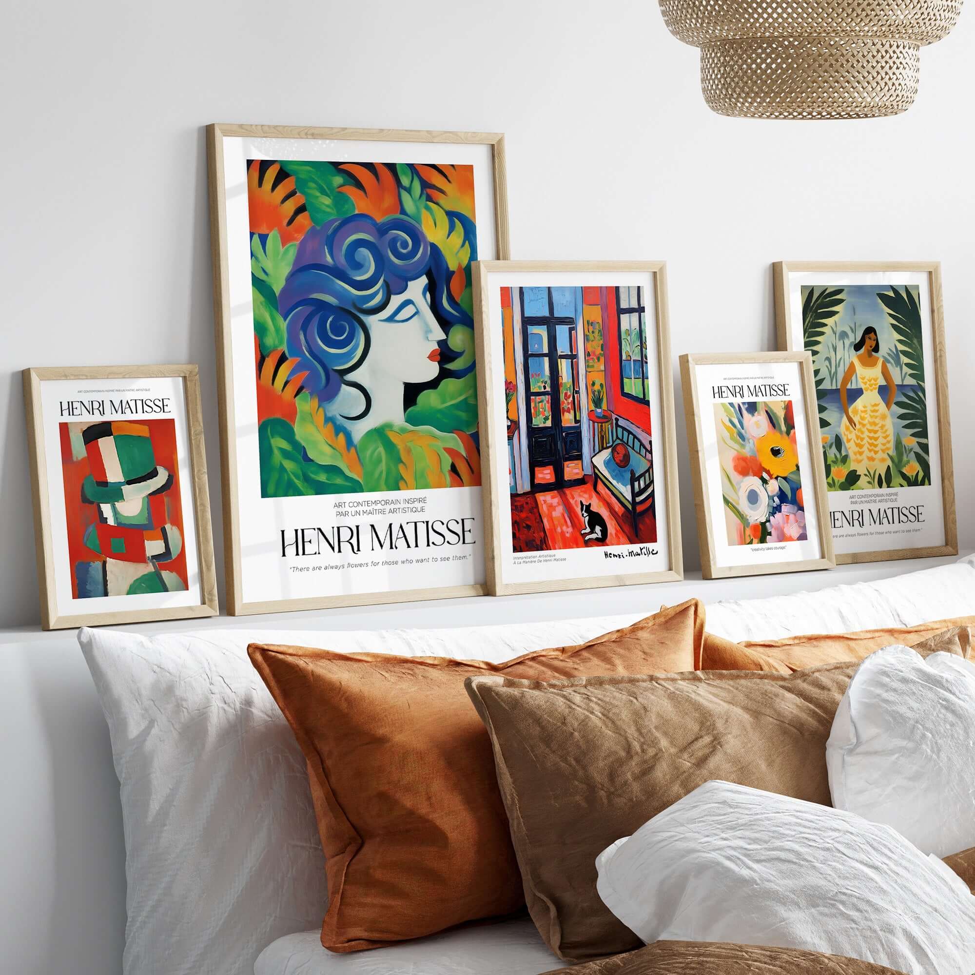 Matisse Art Prints - Woman with Flowers Abstract Art Print displayed in stylish frames on a shelf above a sofa.