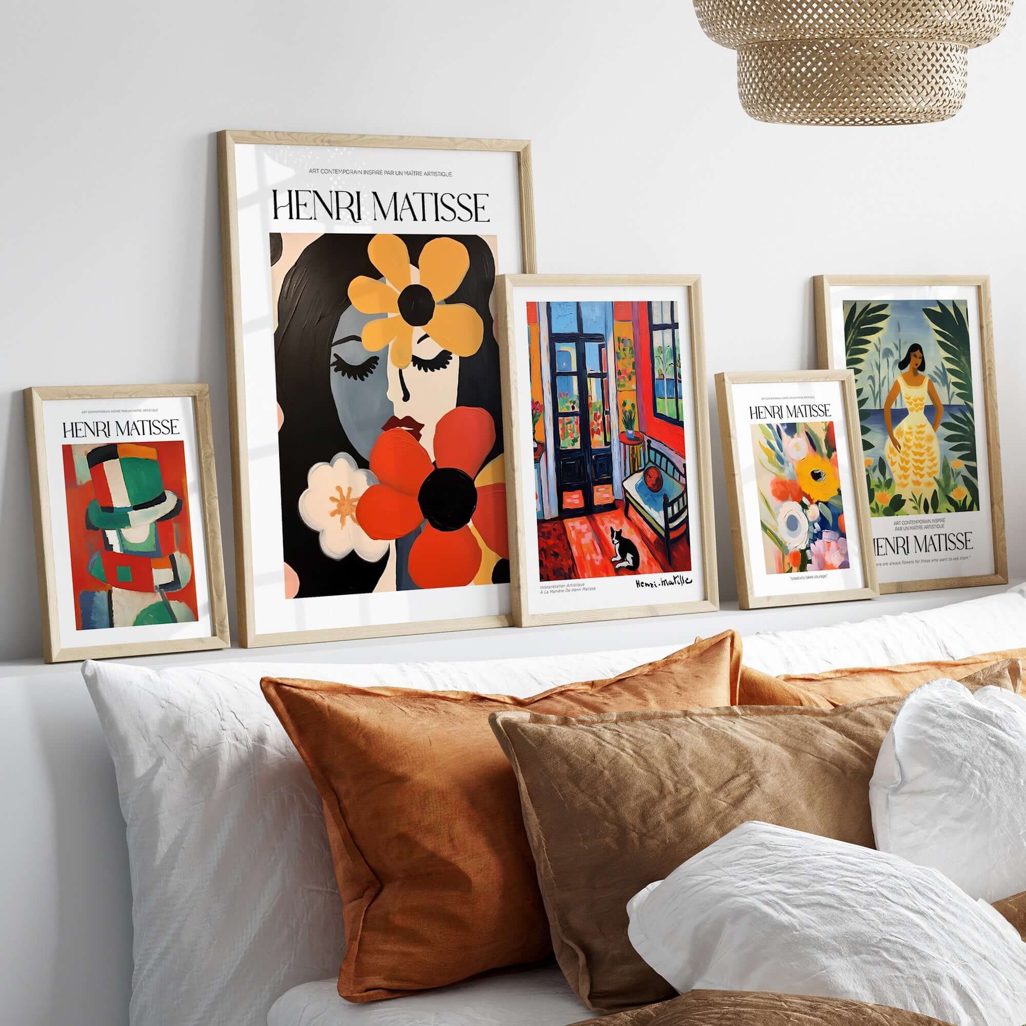 Matisse Art Prints - Woman with Flowers Abstract Art Print displayed among other Matisse artworks on a stylish home decor shelf.