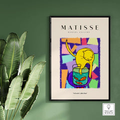 Matisse Art Prints - Yellow Cat with Fishbowl Geometric Poster framed artwork displaying a cat and fishbowl with vibrant colors.