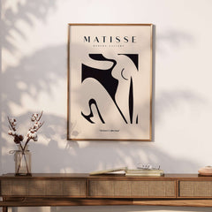 Matisse Art Prints - Black Abstract Nude Figure Poster displayed in modern interior setting.