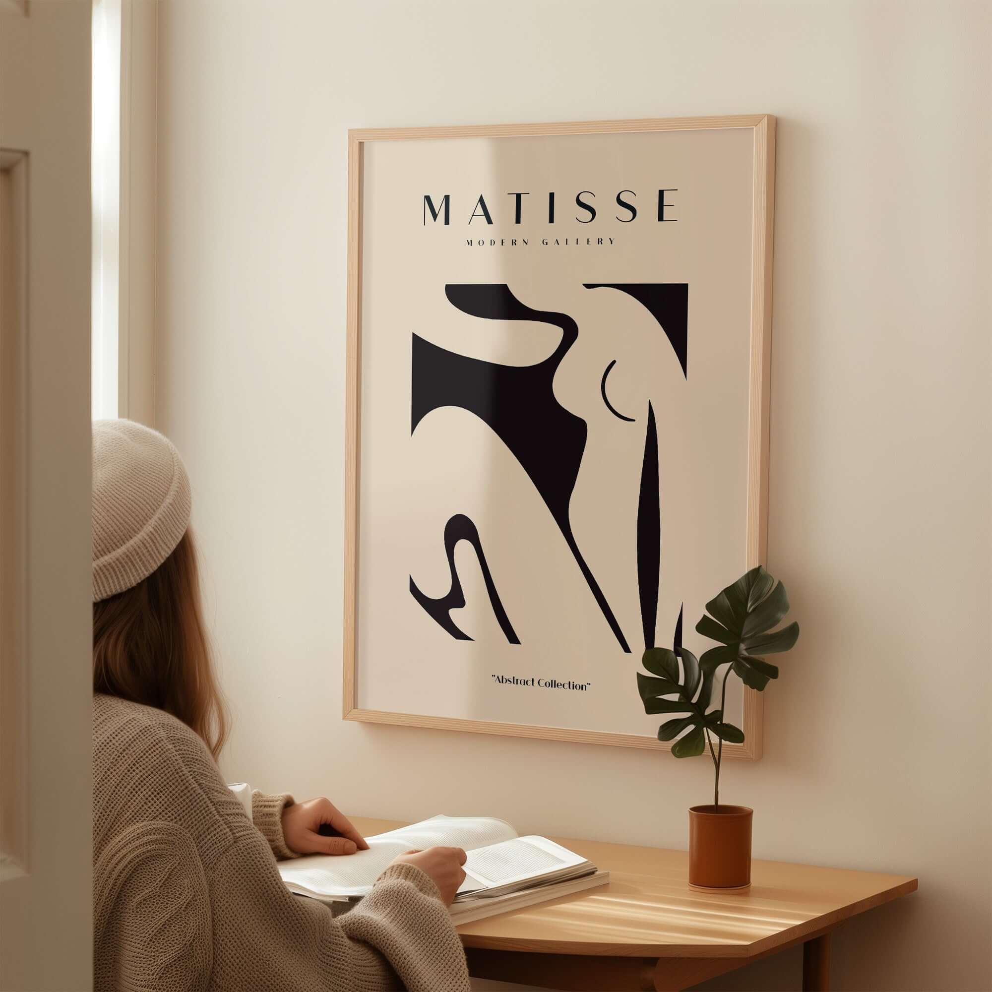 Matisse Art Prints - Black Abstract Nude Figure Poster displayed in a modern interior setting.