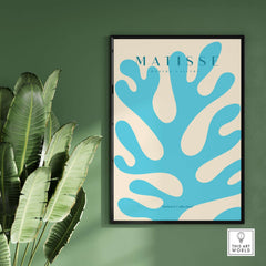 Matisse Art Prints -  Blue Coral Abstract Botanical Art Print Poster displayed in a modern home setting with green wall.