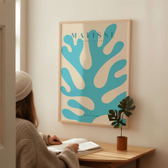 Matisse Art Prints - Blue Coral Abstract Botanical Art Print Poster displayed on wall, featuring cyan blue coral design.