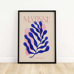 Matisse Blue Leaf Abstract Papiers Découpés Wall Art Print in a black frame featuring blue leaf design.