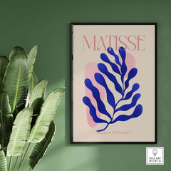 Matisse Blue Leaf Abstract Papiers Découpés Wall Art Print featuring blue leaf design on beige background with pink shapes.