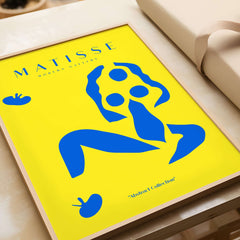 Matisse Art Prints - Blue Nude Abstract Figure Yellow Poster featuring a blue abstract figure on a yellow background.