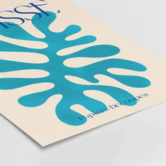 Matisse Cyan Blue Abstract Shape Papiers Découpés Poster with vibrant blue cut-out shape on beige background.