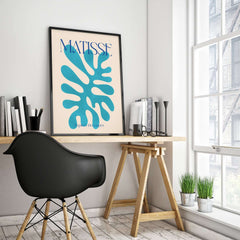 Matisse Cyan Blue Abstract Shape Papiers Découpés Poster displayed in a modern home office setting.