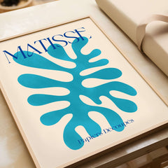 Matisse Cyan Blue Abstract Shape Papiers Découpés Poster featuring a vibrant cyan blue organic shape on a neutral background.