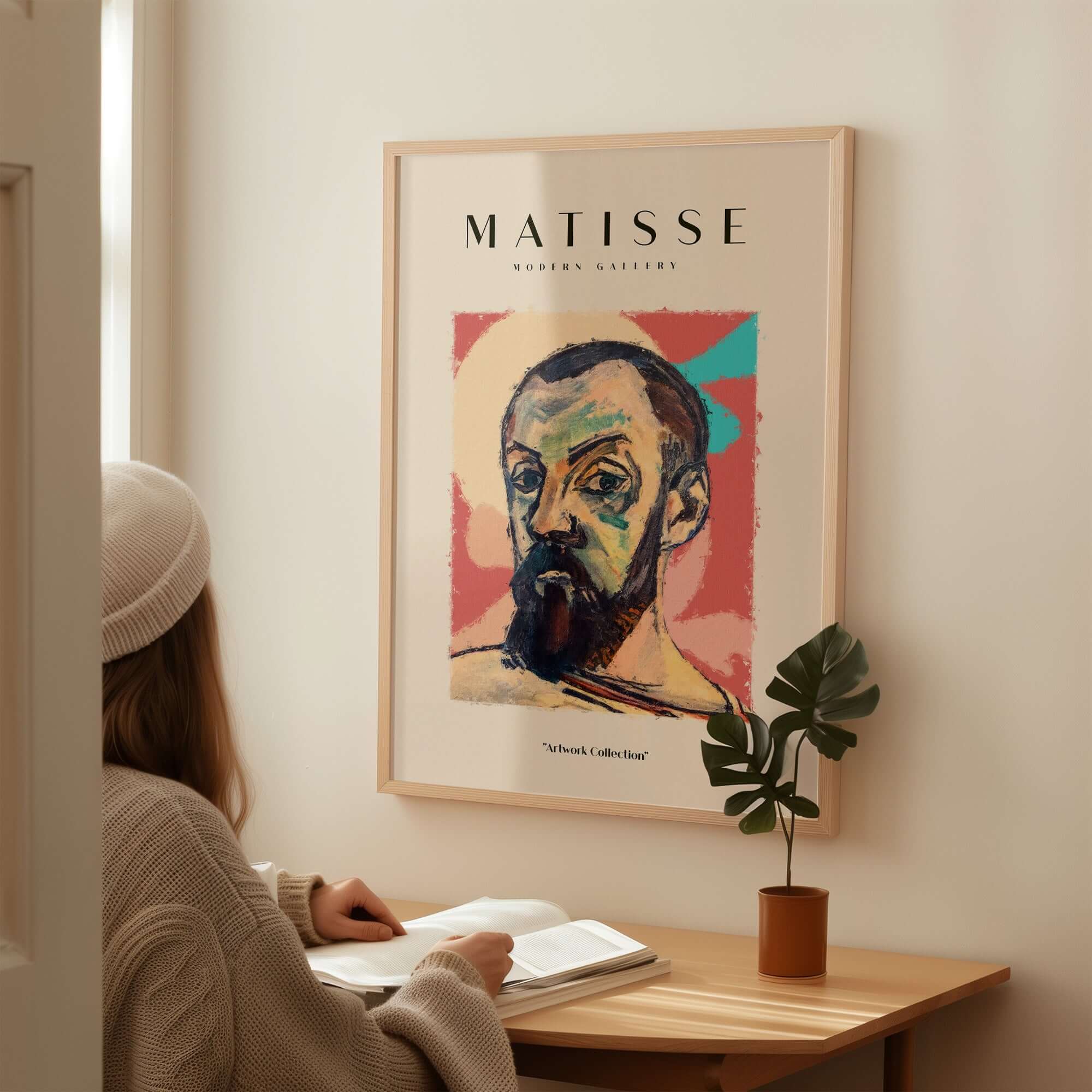 Matisse Art Prints - Expressive Self Portrait Poster framed on wall above a person studying at a table.