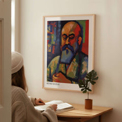 Matisse Art Prints - Fauvist Self Portrait Art Print displayed on wall beside a person reading at a desk.