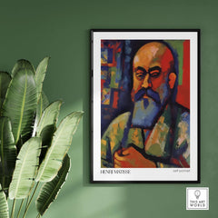 Matisse Art Prints - Fauvist Self Portrait Art Print displayed on a wall with greenery.