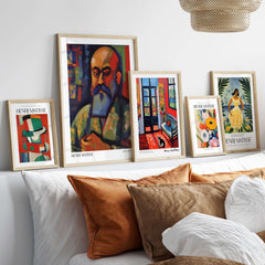 Matisse Art Prints - Fauvist Self Portrait Art Print displayed on a wall above a cozy sofa with decorative pillows.