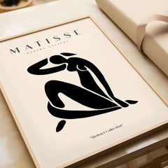 Matisse Art Prints - Figurative Lady Poster Art featuring a black silhouette of a seated woman in minimalist style.